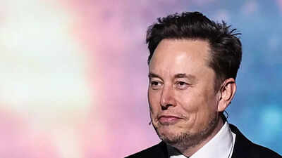 ‘It’ll be something cool’: Elon Musk promises of moon buggies, humanoid robots after  trillion Tesla payday