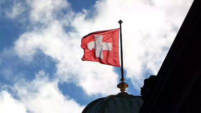 Swiss vote on compulsory civic duty, climate tax for super-rich
