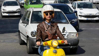 Iran: As traffic chokes Tehran, Women turn to motorbikes despite the ban | World News