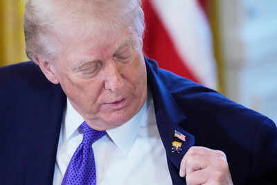 ‘Happy Trump’: Trump wears own lapel pin for meeting on Venezuelan oil | World News