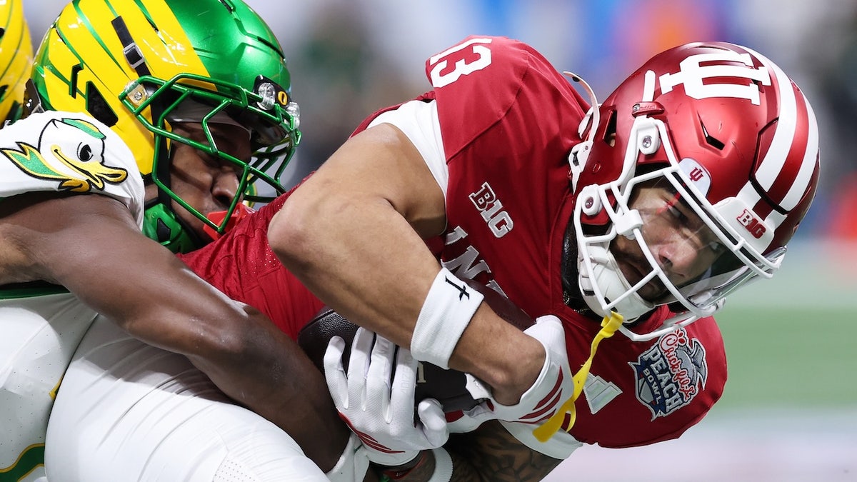 Indiana crushes Oregon 56-22, reach first national championship game