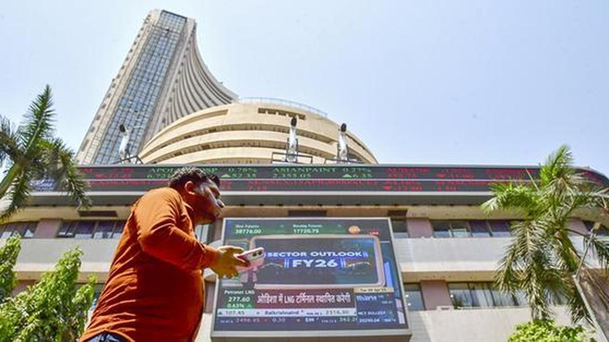 Sensex, Nifty close almost unchanged in choppy trade; IT shares decline