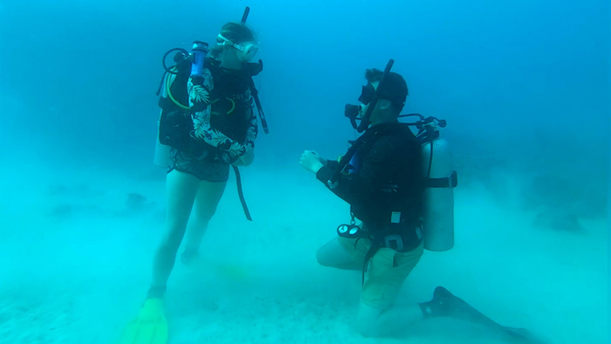 Man’s underwater proposal some 100 feet deep in Fiji waters stuns bride-to-be