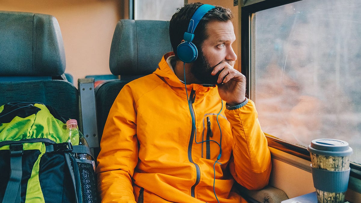 Travelers help fuel audiobook surge amid debate over what ‘counts’ as reading