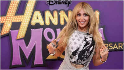 ‘She got money and moved next door’: Miley Cyrus jokes ‘superfan’ Alex Cooper is ‘kinda creepy’ at Hannah Montana 20th anniversary special
