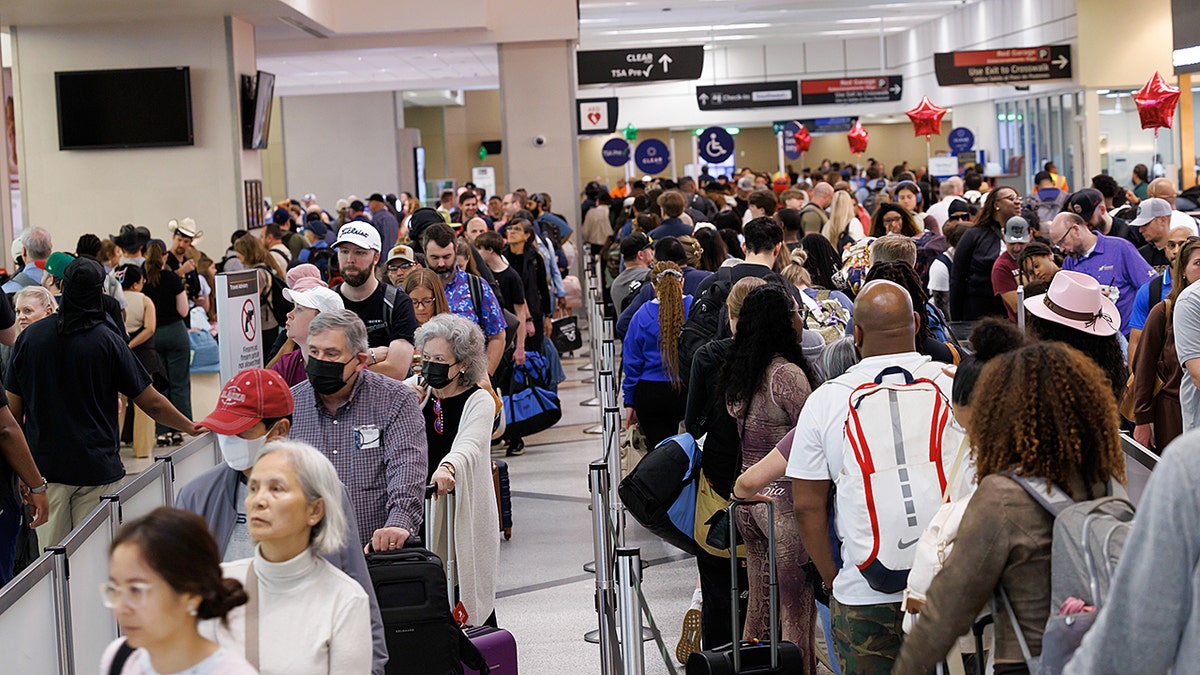 TSA officers call out at record rates during partial shutdown, causing delays