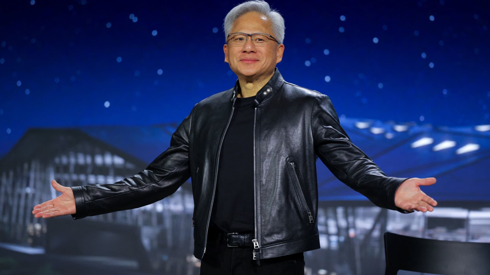 Nvidia stock closes at record, pushing market cap past  trillion