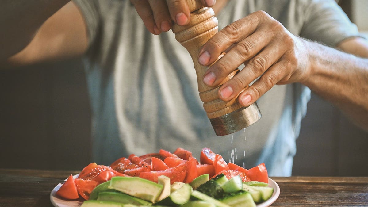 Adding salt at the table linked to troubling health risks for older adults